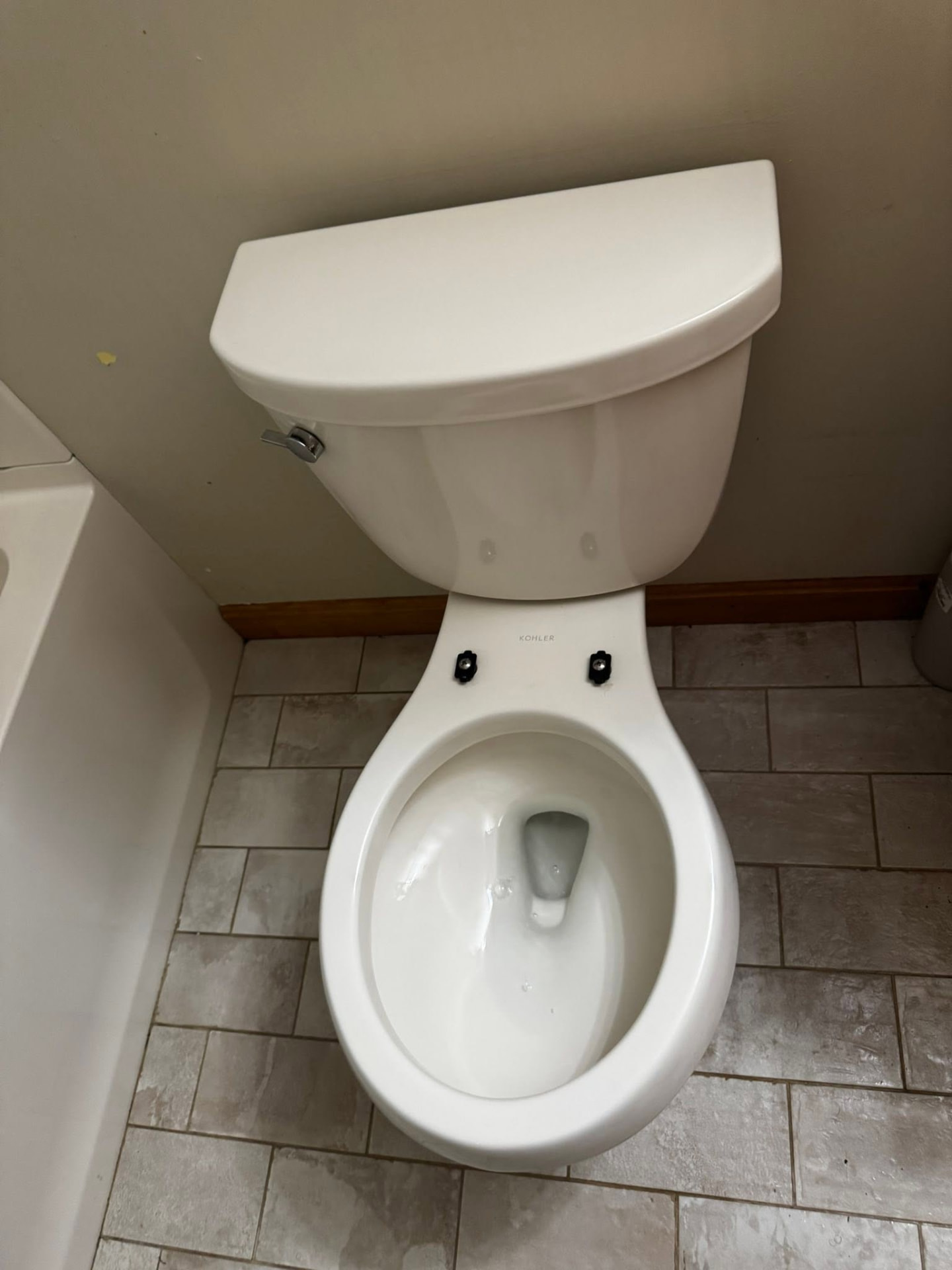 Bathroom toilet after a professional deep cleaning