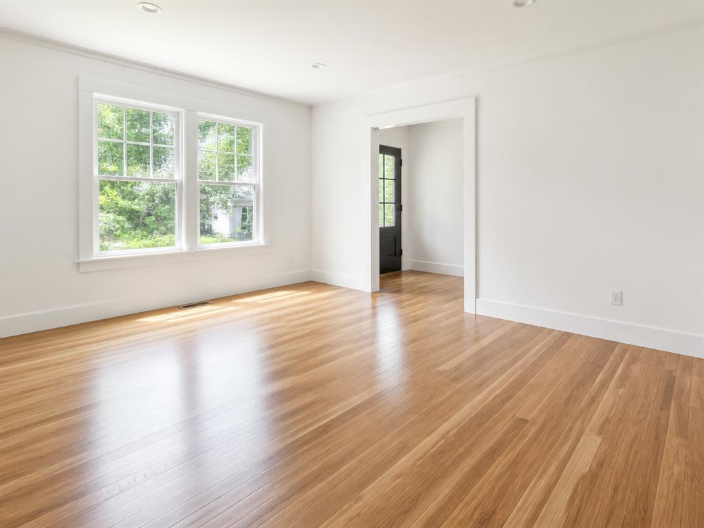 Newly renovated room with clean hardwood floors
